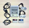 Super Nintendo SNES + 2 Spiele + 2 Controller Super Mario World Fighter Retro