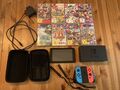 Nintendo Switch Komplett Konsole + 8 Spiele u.a. Zelda, Super Mario Odyssey