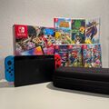 Nintendo Switch OLED + Zubehörpaket +  (7) Spiele + Tasche 