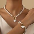 Perlen Halskette und Armband Set elegantes Schmuckset Herz Design Trend