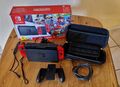 Nintendo Switch 32GB Super Mario Odyssey - Rot (OHNE SPIEL MIT REISETASCHE)