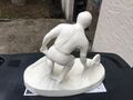 statue de tennisman en faïence très bonne état