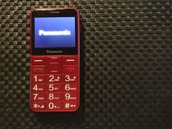 Panasonic KX-TU155 Senioren-Handy Rot neuwertig gebraucht