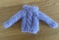 Blyhte Pullover mit Zopfmuster