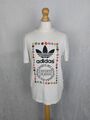 Damen T-Shirt Adidas Pharrel Williams weiß mit Logo und Blumendetail Größe M