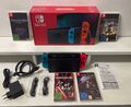 Nintendo Switch 128GB Spielkonsole - Neon-Rot/Neon-Blau Mit 4 Spiele