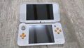 New Nintendo 2DS XL Weiß Orange + 2 Pokemon Spiele