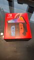 Nintendo Switch OLED HEG-001 64GB Schwarz/Neon-Blau/Neon-Rot