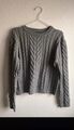 Strickpulli mit Zopfmuster 