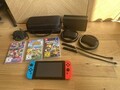 Nintendo Switch  - guter Zustand + 3 Spiele + Tasche + Lenkräder