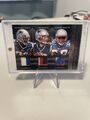 2012 Panini Black Tom Brady, Devin McCourty, Curtis Martin 1/10