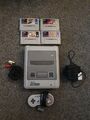 Super Nintendo Entertainment System SNSP-001A mit 1 Controller, 4 Spielen & Kabeln