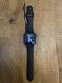 Apple Watch SE 1. Generation 44mm Space Grau mit Gummiarmband in Schwarz (GPS) 