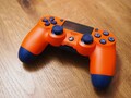 Original PlayStation PS4 DualShock 4 Wireless Controller V2 — Sunset Orange