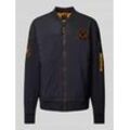 Steppjacke mit Badges