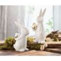 Dekoleidenschaft - 2x Osterhase 'Classical' aus Porzellan, weiß mit Osterei in gold & silber, Hasen 20 + 23 cm hoch, Dekofigur, Dekohase