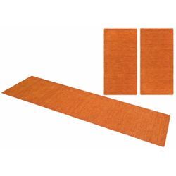 Bettumrandung THEKO "Gabbeh Uni, Handweb Teppich, meliert, reine Wolle" Gr. 14, orange (terra), H:14mm, Obermaterial: 100% Wolle, Bettumrandung, Bettvorleger, Uni-Farben, handgewebt, Läufer-Set, Schlafzimmer